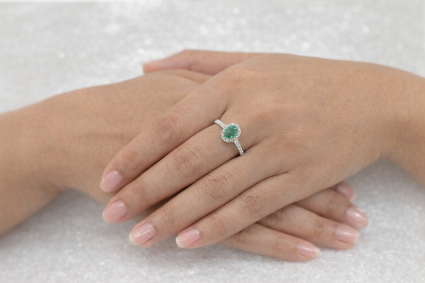 Oval Emerald Diamond Halo Ring